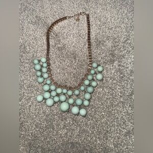 Jade / green color necklace 

Length 8 1/2